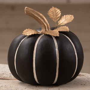 Small black pinstripe pumpkin with white stripes and gold leaf accents perfect for halloween pumpkins and gourds decor