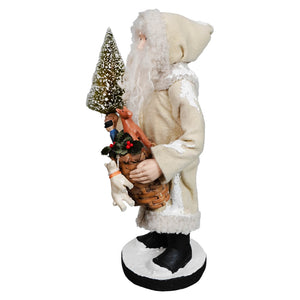Cream-colored small santa figurine by bethany lowe designs holding frosted tree and toy basket festive folk art santa