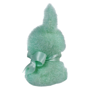 Mint green plush bunny with a satin bow around its neck.