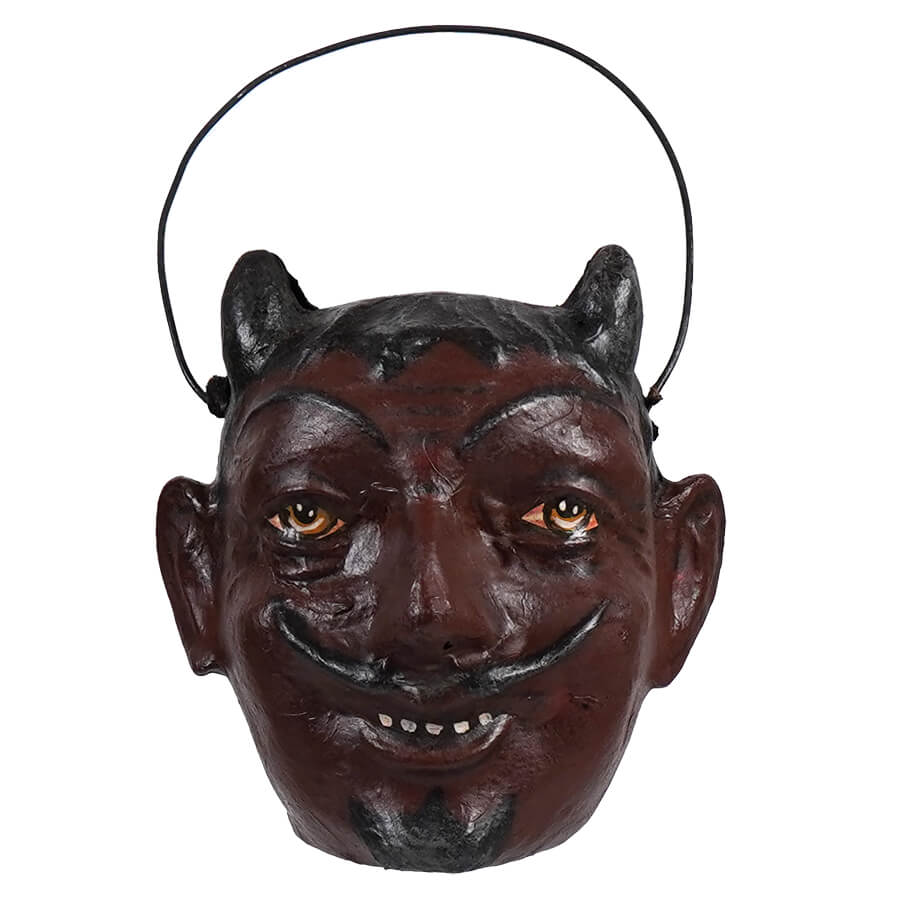 Dark brown devil mask with horns and a mischievous grin.