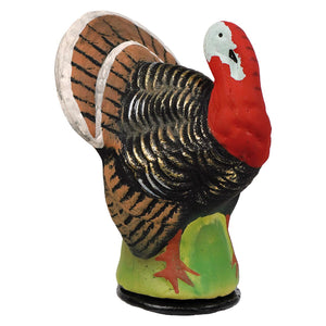 A hand-painted small vintage turkey cachette with a vibrant red head and black gold feathers on a green base