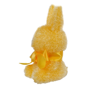 Yellow plush Easter bunny with a bow.