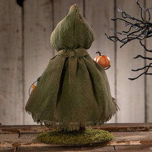 Smiling susie pumpkin bethany lowe witch figurine in olive green burlap holding orange pumpkin with frayed hem