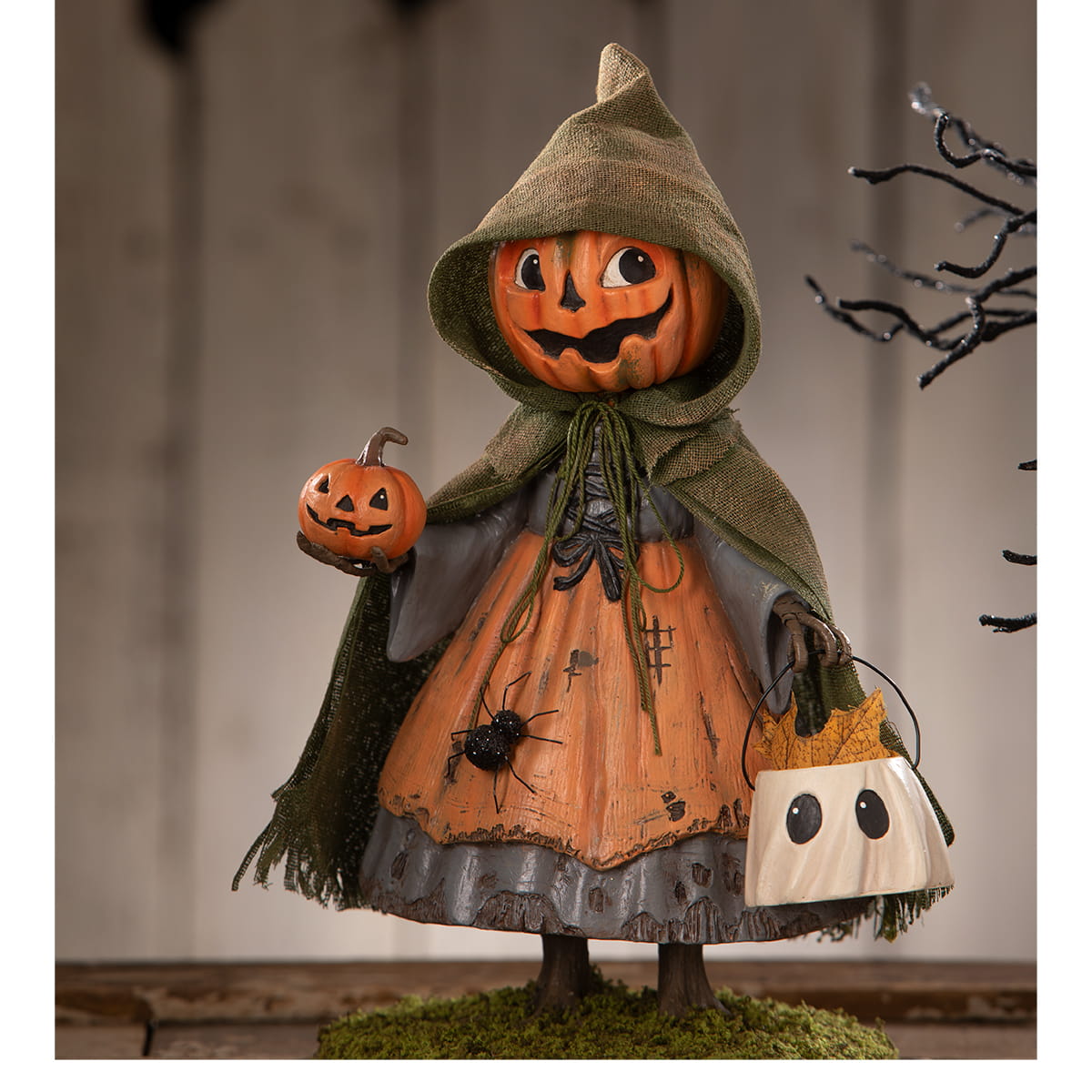 Smiling susie pumpkin scarecrow figurine by bethany lowe with orange pumpkin head green cloak holding jack o lantern and ghost bucket