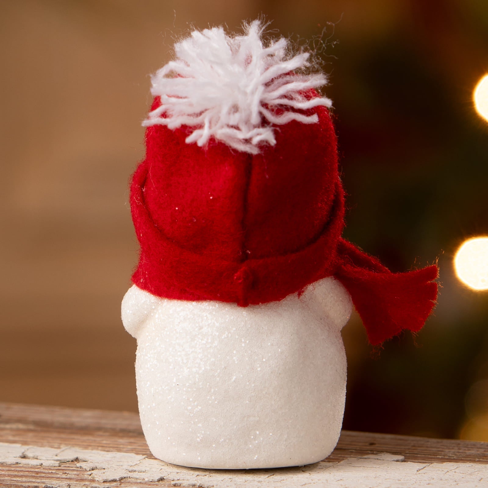 A festive red and white felt snowboy with glasses and a fluffy pom-pom hat from bethany lowe designs christmas snowman decor