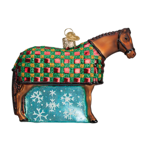 A festive glass snowflake horse ornament with brown body wearing a green red glittery blanket and turquoise base, perfect as lighted decor or dressage horse ornament