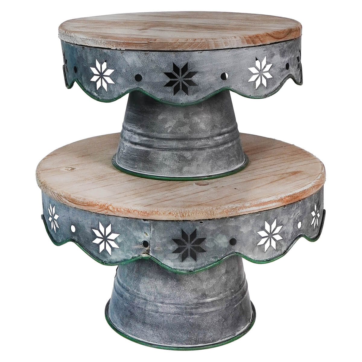 Two-tiered decorative metal and wood cake stands with floral cutout designs.