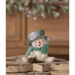 White snowflake top hat snowman figurine with silver glitter hat teal scarf holding green frosted tree by bethany lowe designs