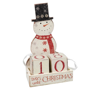 White wooden snowman block countdown with red scarf and black glitter hat showing 10 days until christmas for decor