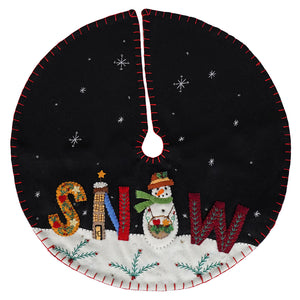 Black felt christmas tree skirt with red stitching and snowman helping to spell out snow in autumnal tones