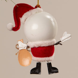 White spherical snowman santa ornament with red velvet hat coat and black boots holding tan sack bethany lowe design