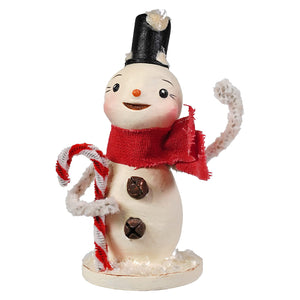 A cheerful white christmas snowman figure with black top hat red scarf and candy canes by bethany lowe designs