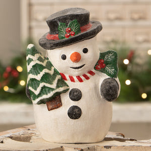 White ceramic snowman figurine with black top hat and holly holding green christmas tree bethany lowe designs christmas snowman figures and decor