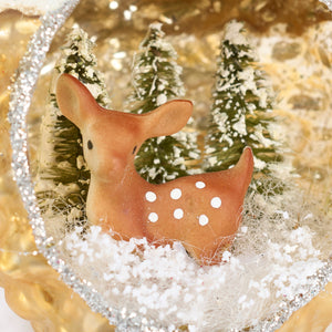 Brown ceramic snowy deer glass ornament with white polka dots nestled in snow among mini trees perfect year-round decor