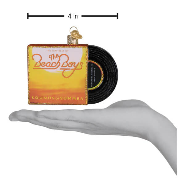 A miniature glass sounds of summer album cover ornament shaped like the beach boys vinyl with gold trim and black record