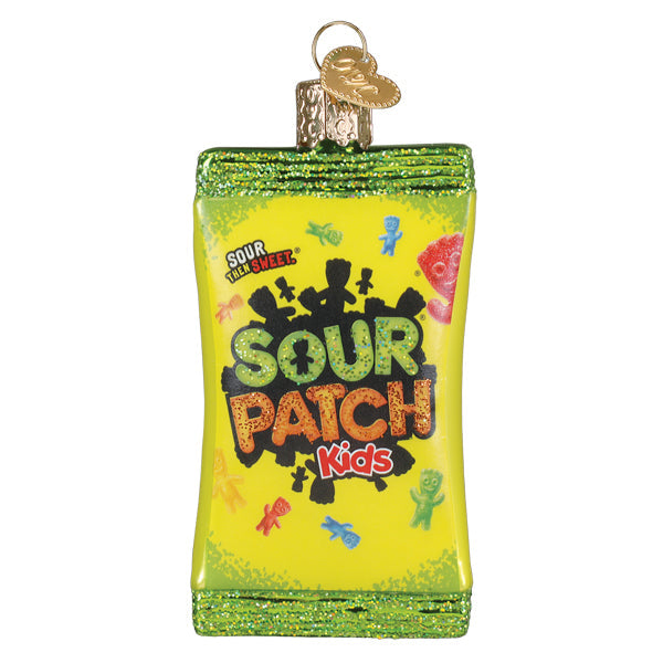 Green glittery glass sour patch kids ornament shaped like candy bag with colorful gummies and bold lettering