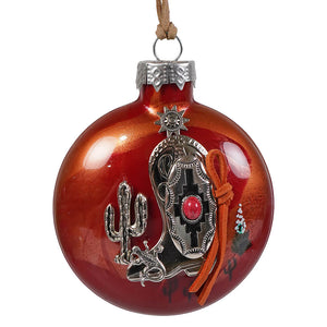 Red glass southwestern cowboy boot christmas ornament with silver boot design, red stone, cactus, and metal accents