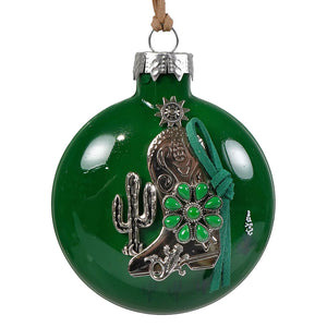 Green glass handcrafted glass ornament featuring a silver cowboy boot with green gemstone and cactus design