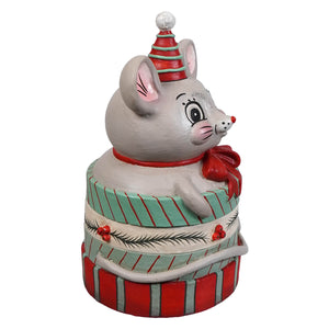 A charming gray mouse figurine wearing a red and green party hat and red bow on a festive gift box from bethany lowe designs boo gift box