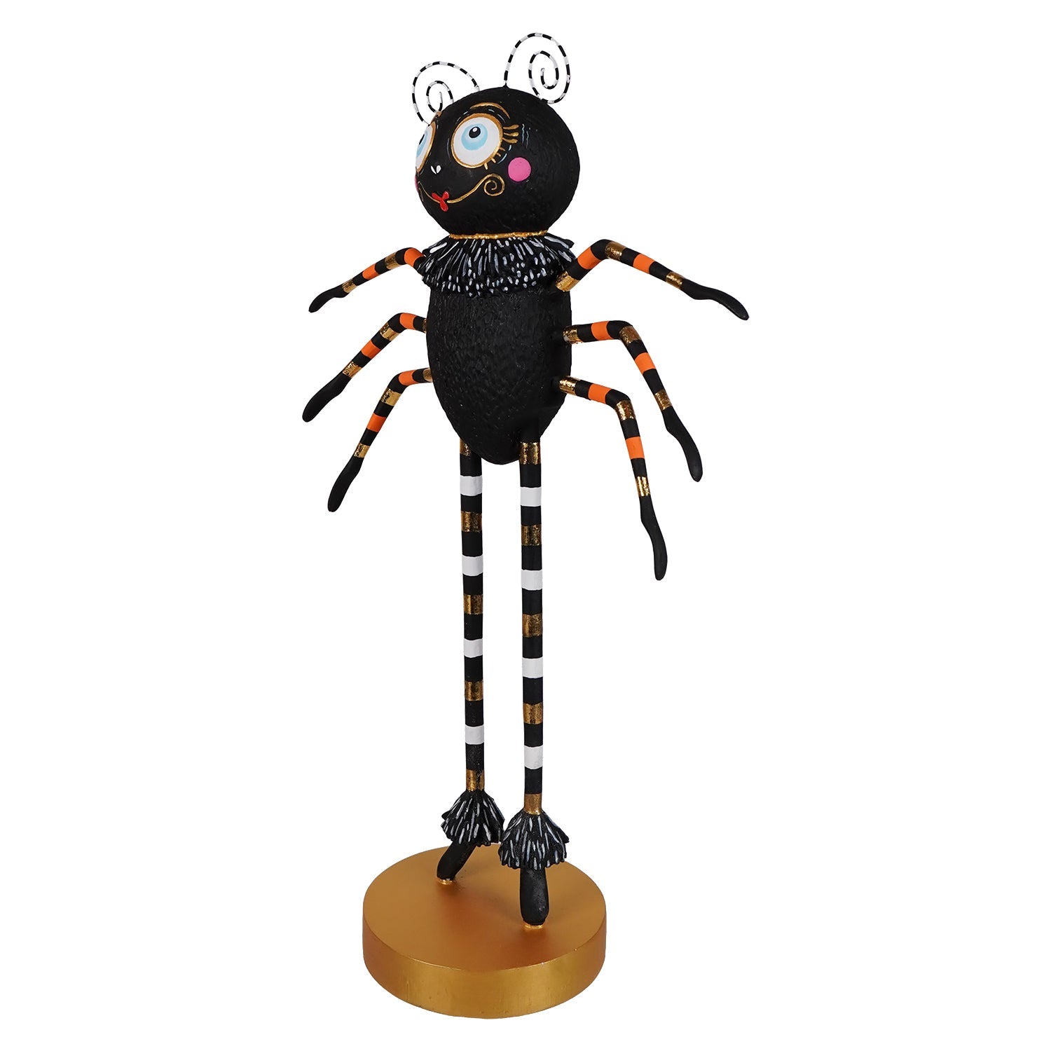 A whimsical spinderella spider figurine with orange white striped legs and gold accents on a golden base for halloween display
