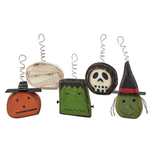 Set of five vintage inspired spooky ornament set featuring painted wooden halloween characters pumpkin witch skull mummy frankenstein