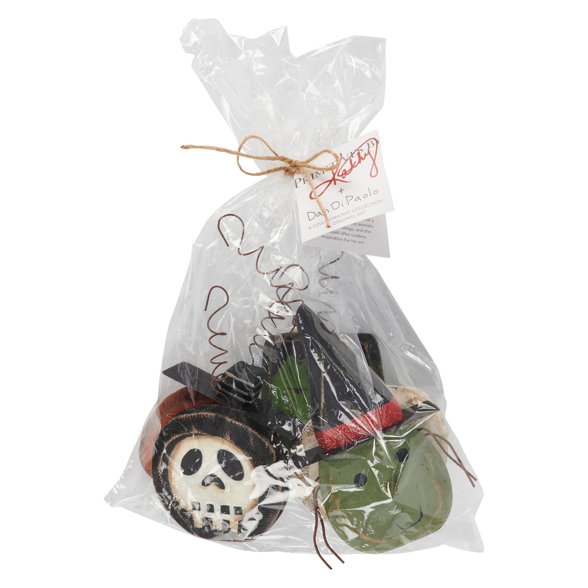 A spooky ornament set featuring black green and white halloween masks with painted facial features for decoration