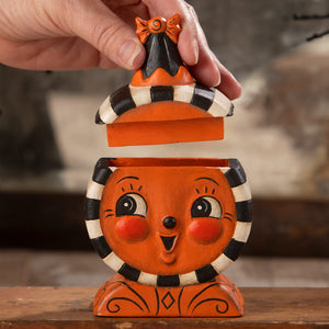 Orange ceramic halloween jack o lantern laughing treat box with black white stripes and orange bow lid