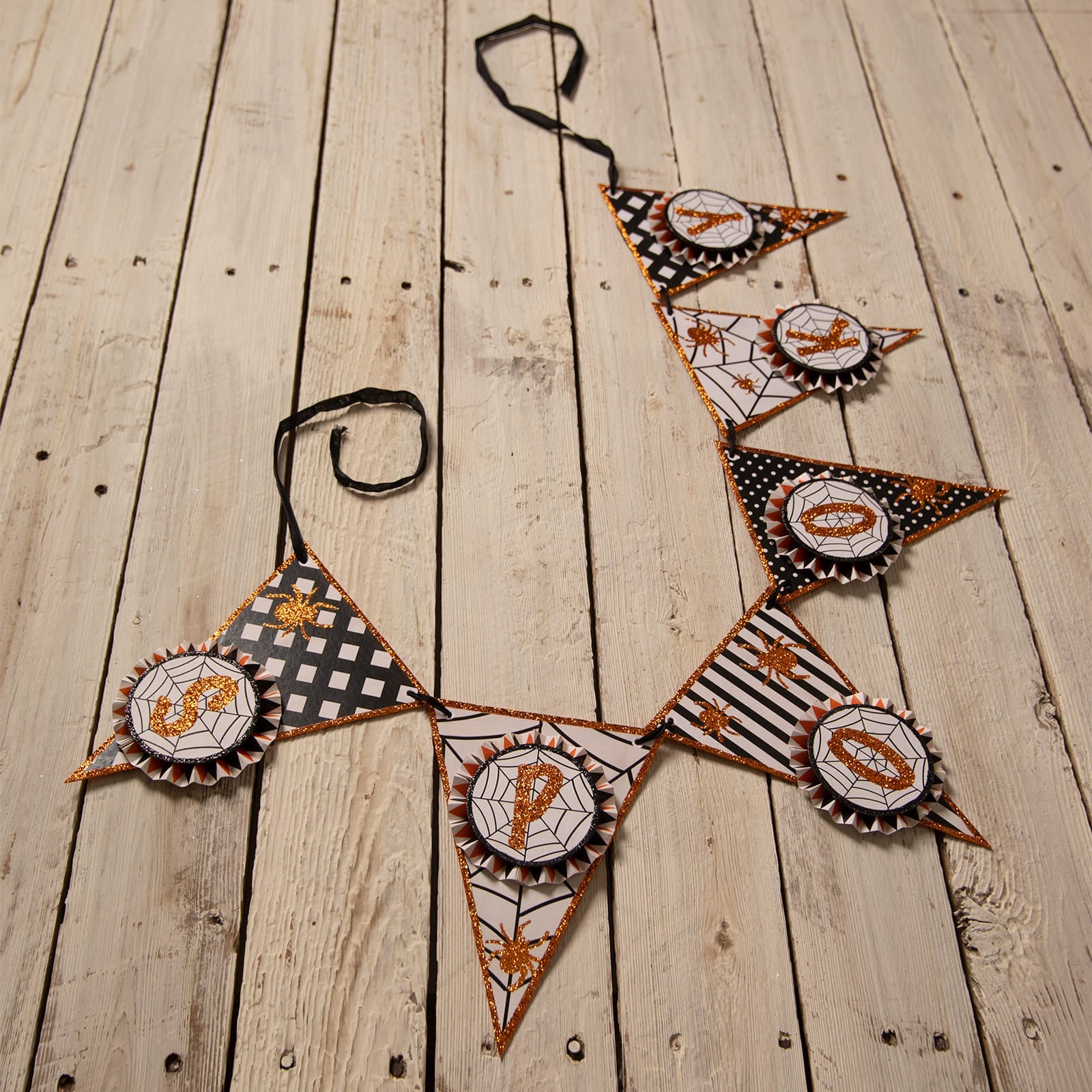 Spooky spider garland halloween garlands with black white and orange glitter spiderweb rosettes and tinsel accents