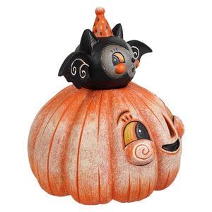 Orange halloween pumpkin with a black bat wearing an orange polka-dot party hat called squatty pumpkin batty