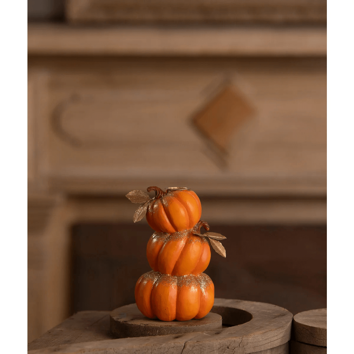 Stack of pumpkins candle holder with stacked orange pumpkins hand-painted resin gold glitter and metallic leaves by bethany lowe