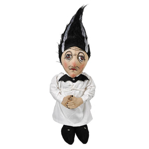 A whimsical carmella stein hand-painted doll wearing a white dress and tall black feathered hat standing upright