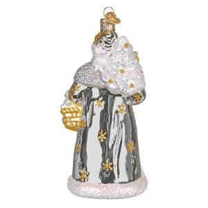 Silver and gold glittery glass christmas glass ornament of santa holding a decorated tree workshop santa ornament