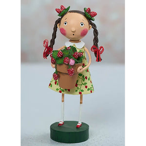 A lori mitchell strawberry fields figurine of a girl in green dress with strawberries holding a pot of fresh berries