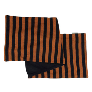 Black and orange striped woven textile pillowcase perfect for halloween runners and holiday table runners decor