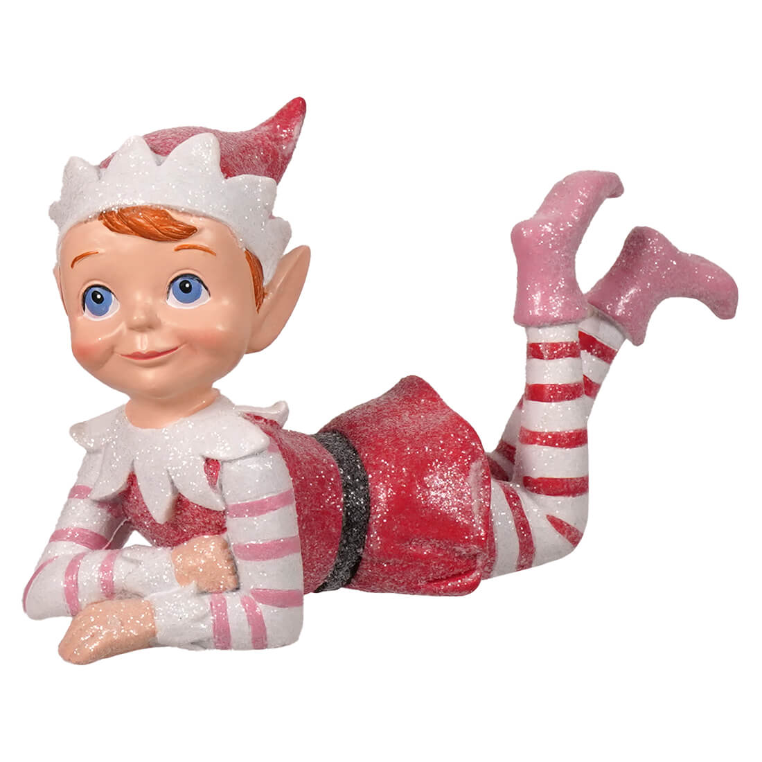 A glittery pink and white resin elf figurine with blue eyes wearing a striped outfit and pointed hat sugar coated sweet lying