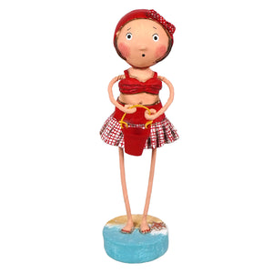 Lori mitchell summer figurine in red and white checkered swimsuit with red polka dot headscarf on blue base