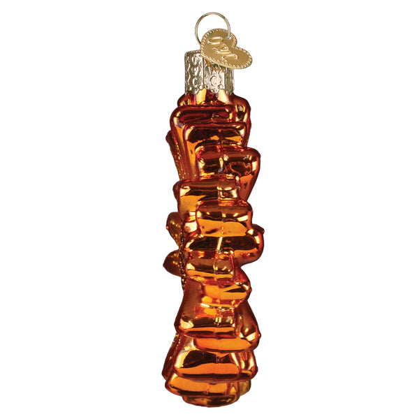 Sunset gerbera daisy ornament made of amber glass with a twisted rope design and silver heart tag for flower and garden ornaments