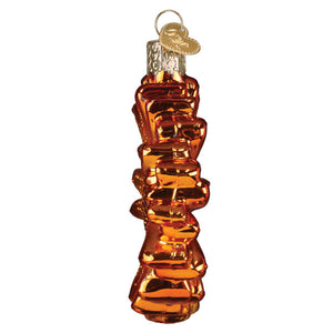 Sunset gerbera daisy ornament made of amber glass with a twisted rope design and silver heart tag for flower and garden ornaments