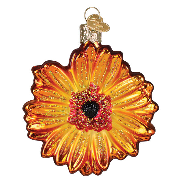Vibrant orange and yellow glass gerbera daisy ornament with glittery red center and gold accents for flower & garden ornaments