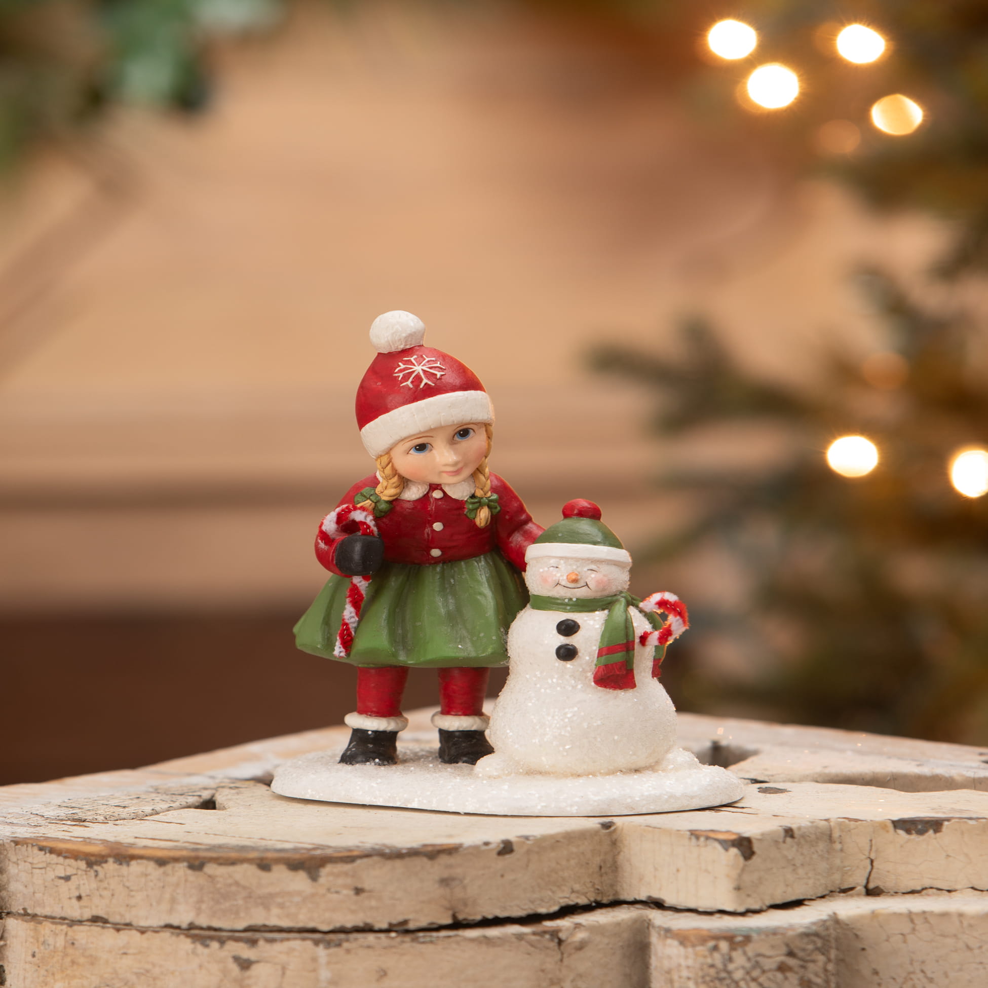 Festive bethany lowe designs resin susie with snowman figure in red and green holding candy canes for christmas decor