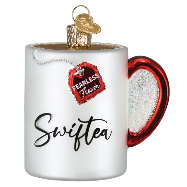 A white glass swiftea mug ornament with a red glitter heart handle and a fearless flavor tea tag, perfect dad mug ornament