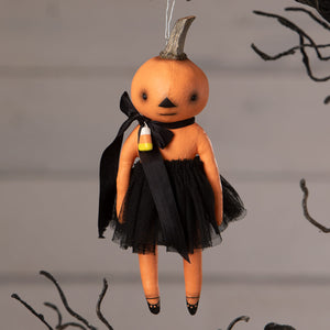 Orange pumpkin ornament doll with black tulle skirt and candy corn pendant perfect for halloween pumpkins and gourds decor