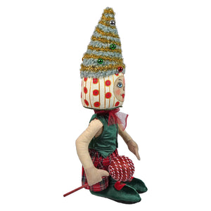 Whimsical tabitha tree standing doll with festive tree hat, polka-dotted face, and plaid skirt standing upright