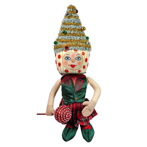 A whimsical tabitha tree standing doll with a cupcake head, glittery stripes, blue eyes, and green velvet vest