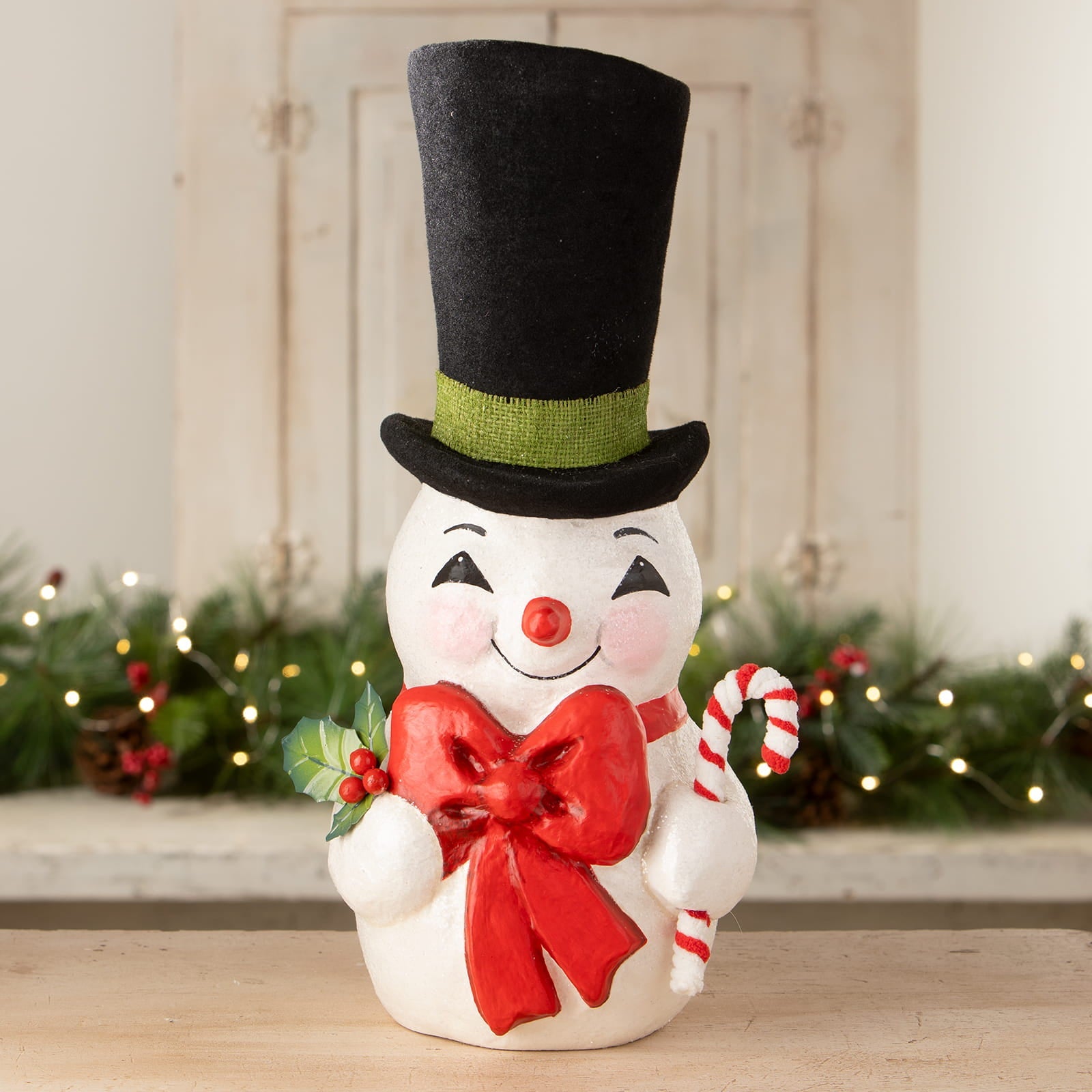 Tall hat jolly snowman figurine by bethany lowe designs with white body black top hat green ribbon red bow candy cane christmas snowman figures & decor