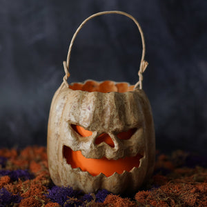 Tan scary face pumpkin bucket lantern with raggedy junction design off-white handcrafted folk art light inside