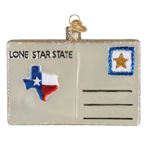 Glittery glass texas postcard ornament with state flag design lone star state text and gold hanging loop