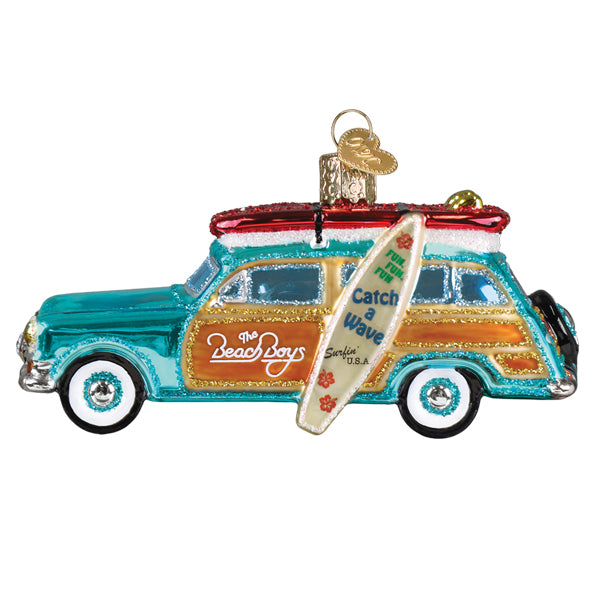A vibrant turquoise and orange vintage station wagon ornament with surfboard and beach boys logo perfect as album ornament