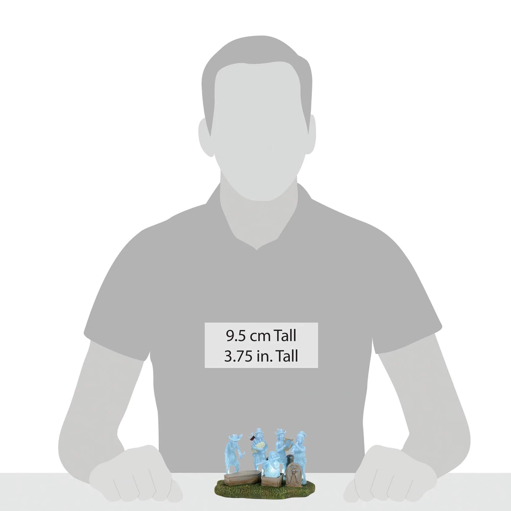 A translucent light blue phantom five figurine set by department 56 showing a miniature band on a grassy base