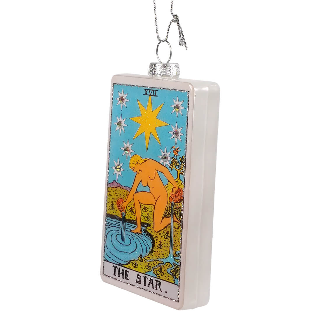 The star tarot card glass ornament features a translucent white planchette glass design with a golden figure by cody foster